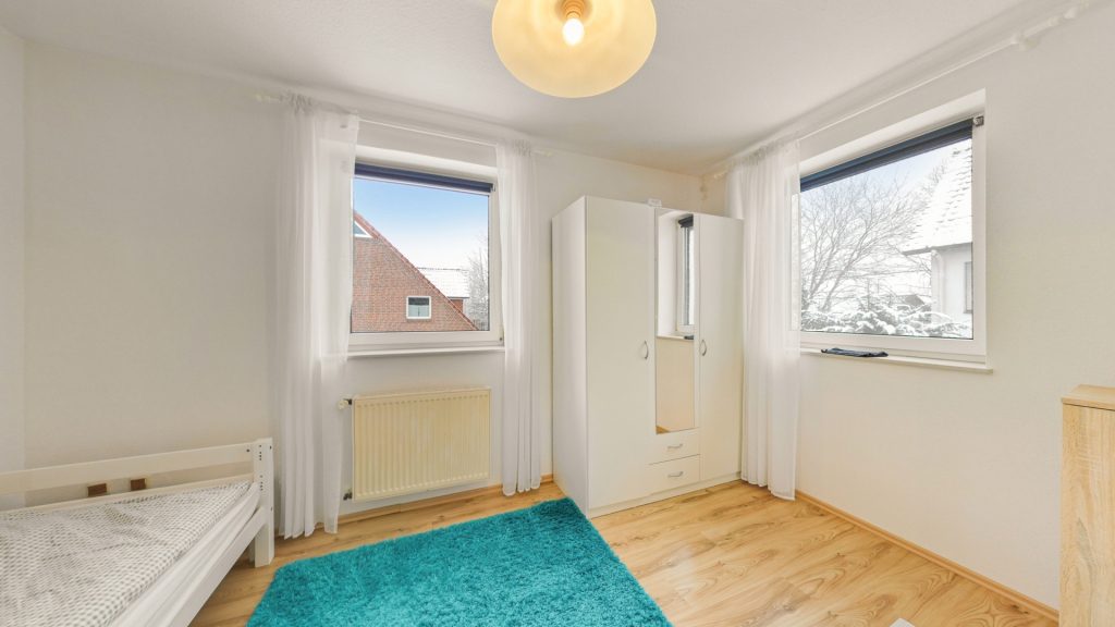 Immobilienangebot - Oldenburg - Wohnen - Vermietete Doppelhaushälfte mit Garten, Balkon und viel Potenzial in Kreyenbrück zu verkaufen!