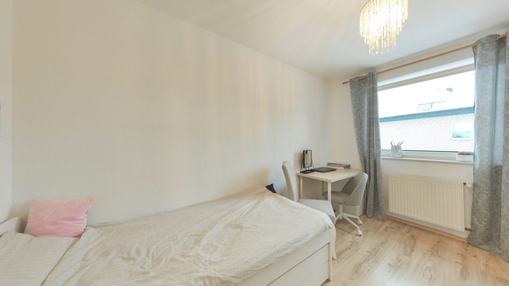 Immobilienangebot - Oldenburg - Wohnen - Vermietete Doppelhaushälfte mit Garten, Balkon und viel Potenzial in Kreyenbrück zu verkaufen!